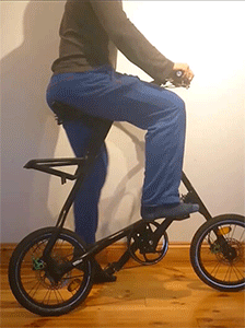Animation of folding the strida and walking away rolling it along