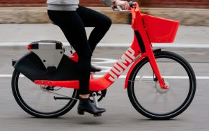 Side view of Uber JUMP ebike being riden on the street