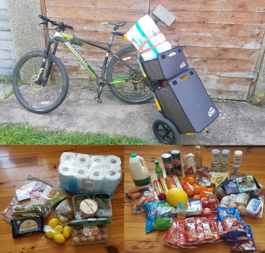 Burley Travoy trailer attached to mountain bike and loaded with shopping, with seperate views showing the large quantity of shopping which fitted inside.